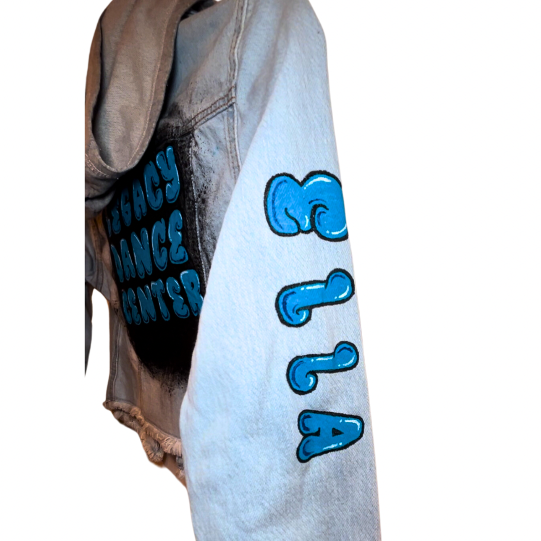 Legacy Dance Center custom hand painted denim jacket for children, girls. Blue denim. Black spray paint. Hand painted graffiti.