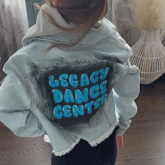 Legacy Dance Center custom hand painted denim jacket for children, girls.  Blue denim.  Black spray paint.  Hand painted graffiti.  Best seller.